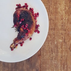 Roast chicken pieces in pomegranate drizzle